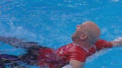 Tucak u bazenu nakon svjetskog naslova, Foto: HTV/HRT