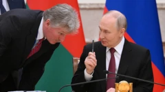 Dmitrij Peskov i Vladimir Putin