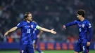 Croatian football team Captain Luka Modrić gives five to a teammate
