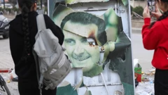 Otrgnuti plakat Bašara al-Asada