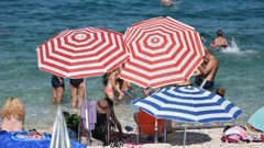 Turisti na plaži