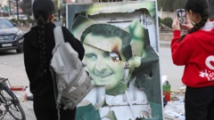 Otrgnuti plakat Bašara al-Asada, Foto: Orhan Qereman/Reuters