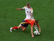 Toni Kroos faulira Danija Olma, Foto: Leonhard Simon/REUTERS