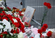 Ožalošćeni Moskovljani donose cvijeće na mjesto terorističkog napada, Foto: Maxim Shemetov/Reuters