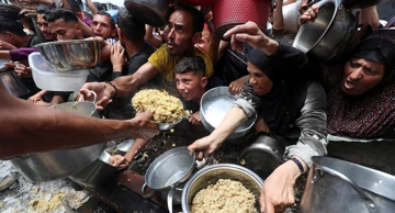 Palestinci čekaju u javnoj kuhinji, Jabalia 14. svibnja
