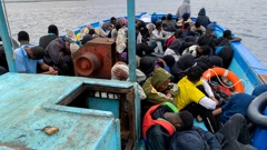 Migranti na brodu, ilustracija