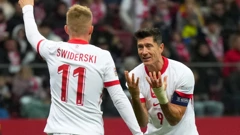 Karol Swiderski i Robert Lewandowski