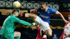 Kemar Roofe i vratar Slavije Ondrej Kolar