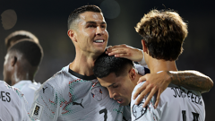  Joao Cancelo, Cristiano Ronaldo i Joao Felix
