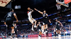  Brandon Ingram šutira preko Ivice Zupca