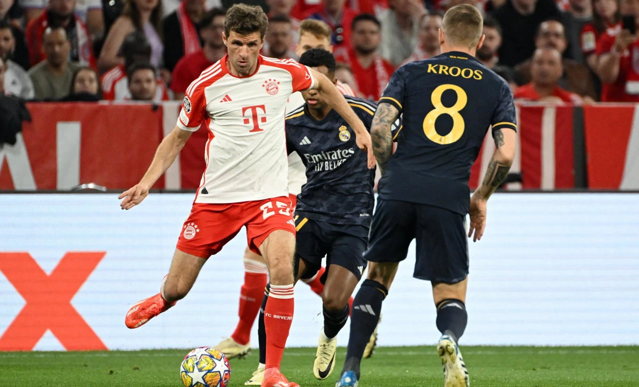 Thomas Mueller, Rodrygo i Toni Kroos, Foto: Angelika Warmuth/REUTERS