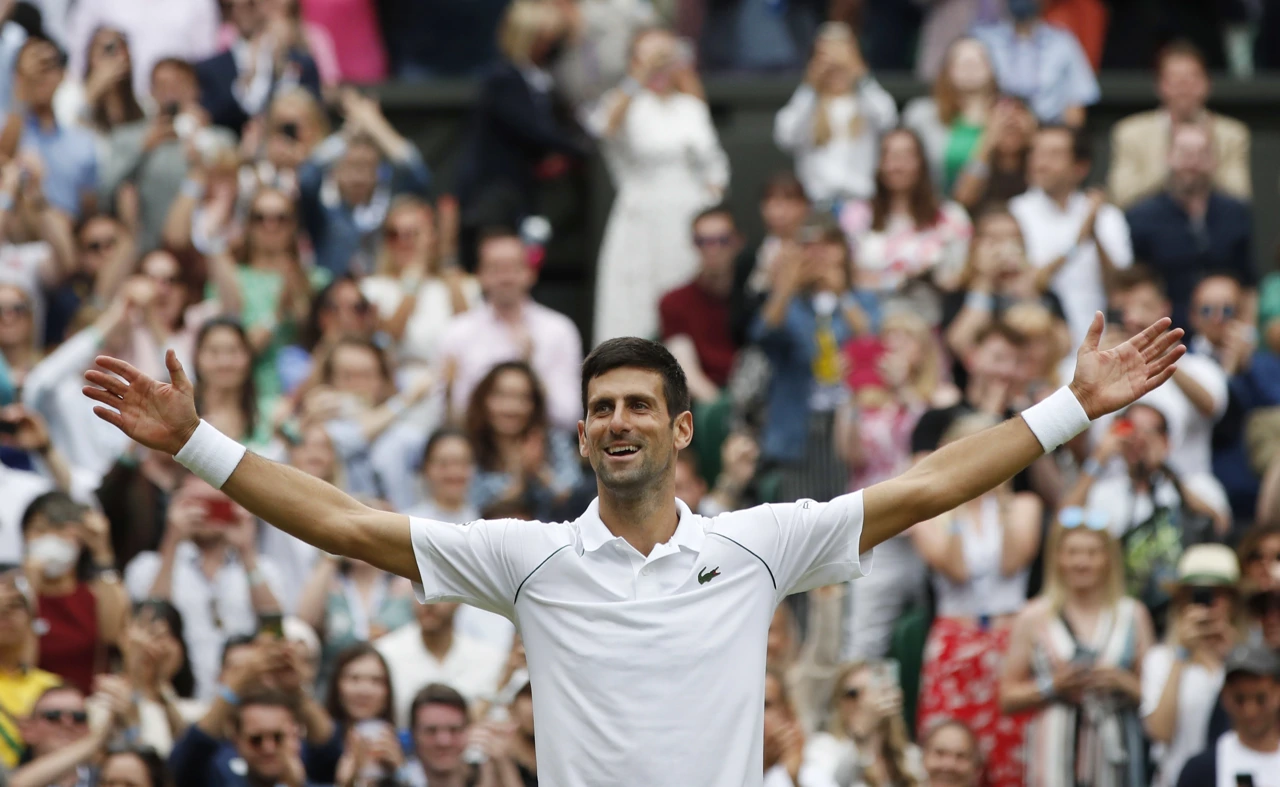 Novak Đoković slavi osvajanje Wimbledona, Foto: Paul Childs/REUTERS