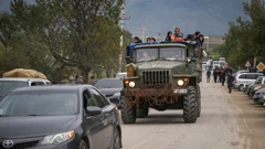 Izbjeglice Gorskog Karabaha stižu kamionima u pogranično selo Kornidzor u Armeniji