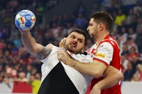 Hrvatska - Austrija. Tobias Wagner i Marko Mamić, Foto: Kai Pfaffenbach/REUTERS