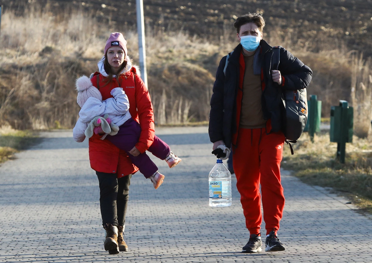 Ljudi prelaze ukrajinsko-poljsku granicu, Foto: Kacper Pempel/REUTERS