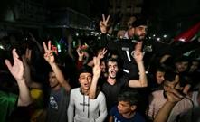 Palestinci slave na ulicama nakon primirja na jugu Gaze, Foto: Ibraheem Abu Mustafa/Reuters