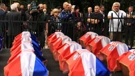 Caskets awaiting burial