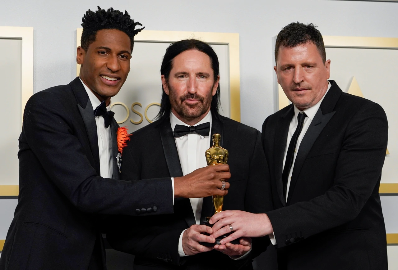Jon Batiste, Trent Reznor i Atticus Ross, Foto: Chris Pizzello/Pool via REUTERS