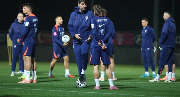 Vedran Ćorluka y Luka Modrić 
