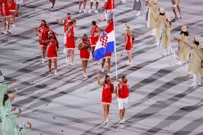 Josip Glasnović i Sandra Perković nosili hrvatsku zastavu, Foto: Igor Kralj/PIXSELL