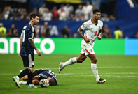 Jude Bellingham u duelu s Alexis Mac Allisterom, Foto: Dylan Martinez/REUTERS