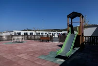 Igralište za djecu u zatvorenom centru za migrante, Samos, Grčka, Foto: Alkis Konstantinidis/Reuters