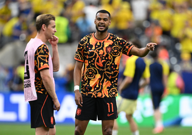 Nizozemci Cody Gakpo i Frenkie de Jong tijekom zagrijavanja, Foto: Annegret Hilse/REUTERS