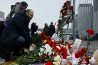 Ožalošćeni Moskovljani donose cvijeće na mjesto terorističkog napada, Foto: Maxim Shemetov/Reuters