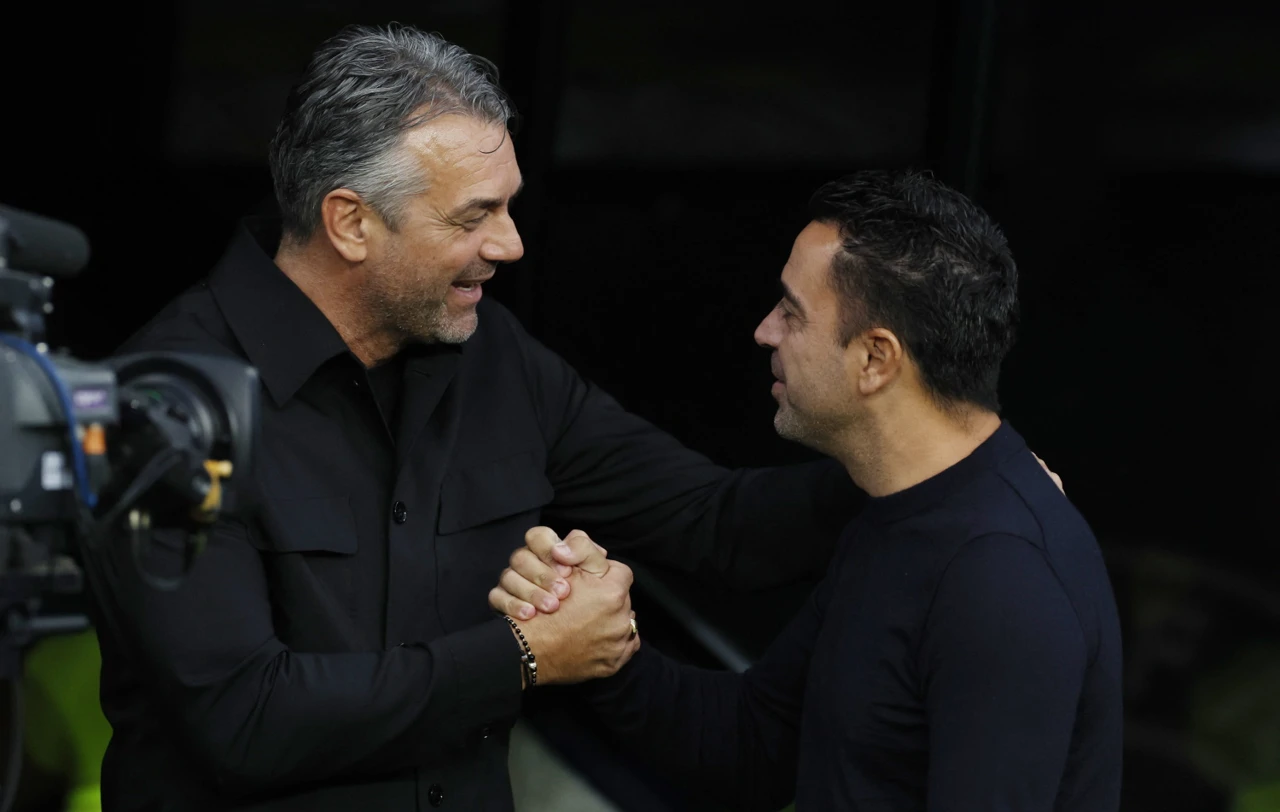 Marino Pušić i Xavi, Foto: Albert Gea/REUTERS