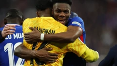 Mike Maignan i Aurelien Tchouameni