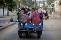 Pojas Gaze: Palestinci napuštaju kuće tijekom napada, Foto: Mohammed Salem/REUTERS