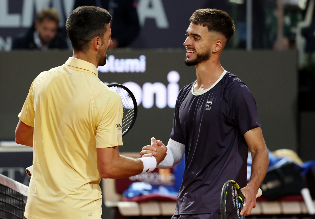 Novak Đoković i Dino Prižmić, Foto: Claudia Greco/REUTERS
