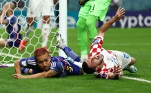  Yuto Nagatomo i Josip Juranović , Foto: Marko Djurica/REUTERS