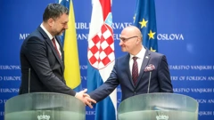 Elmedin Konaković (lijevo), Gordan Grlić Radman (desno)