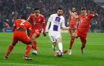 Messi između tri igrača Bayerna, Foto: Kai Pfaffenbach/REUTERS