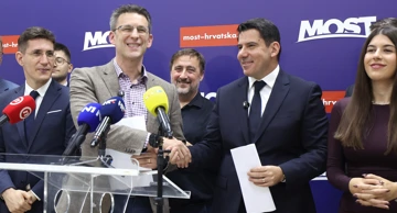 Outgoing MOST leader Božo Petrov and new MOST president Nikola Grmoja