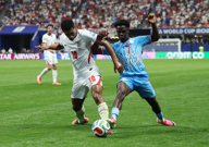 Jude Bellingham i Nathanael Mbuku, Foto: Paul Childs/REUTERS