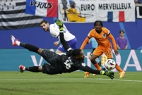 Maignan brani udarac Frimponga, Foto: John Sibley/REUTERS