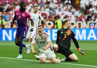 Roland Sallai , Antonio Rudiger i Manuel Neuer, Foto: Kai Pfaffenbach/REUTERS
